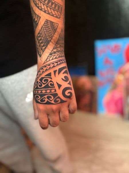 Tribal + Black-work tribal patterns tattoo on Hand by TattooHut on TattMe