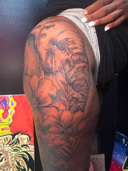 Black & Grey + Illustrative elephant tattoo on Thigh by TattooHut on TattMe