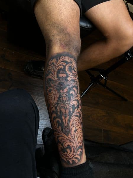 Black & Grey + Illustrative crucifixion tattoo on Calf by inkedonmarz on TattMe