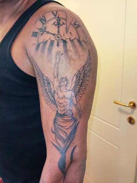 Black & Grey + Illustrative angel tattoo on Upper Arm by sam on TattMe