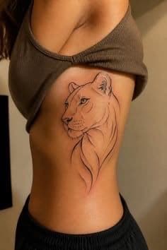 Fine Line + Black-work lioness tattoo on Ribs by sam on TattMe