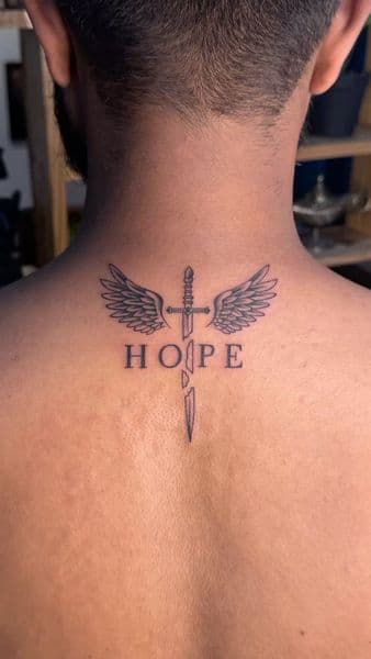 Black-work + Lettering sword tattoo on Neck (Back) by sam on TattMe