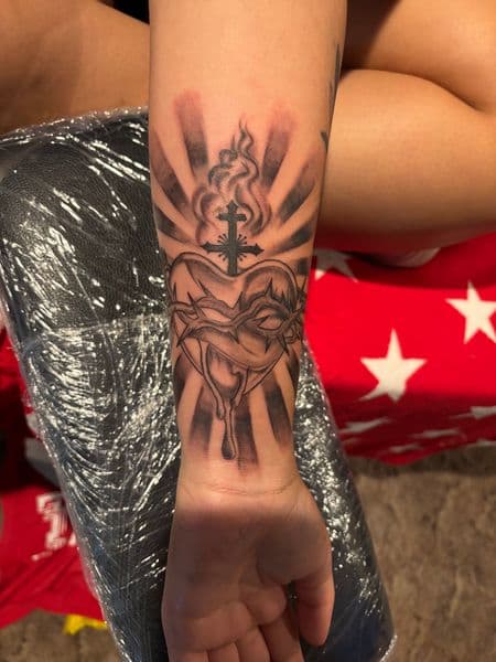 Black & Grey + Illustrative sacred heart tattoo on Forearm by Jake_Cirilo on TattMe
