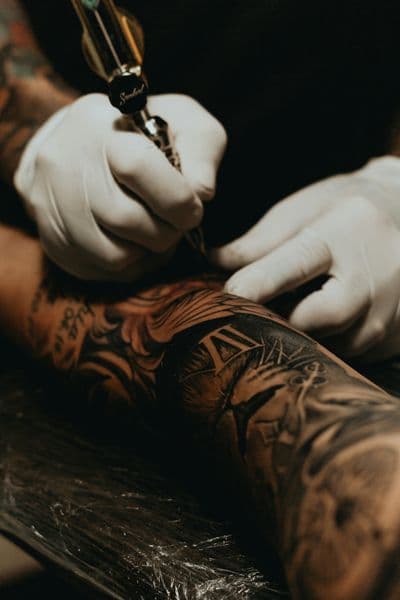 Black & Grey + Illustrative roman numerals tattoo on Forearm by Adimiz_Tattoo on TattMe