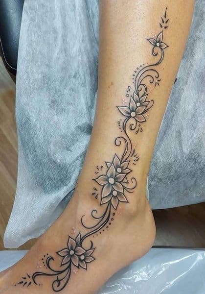 Floral + Black & Grey flowers tattoo on Ankle by Mindful_Essence_Tattoo on TattMe