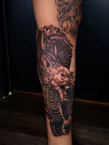 Japanese + Black & Grey dragon tattoo on Calf by SlickRick_inks on TattMe