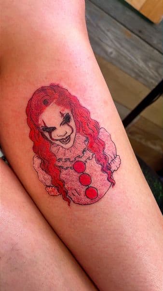 Illustrative + Color clown tattoo on Thigh by PoeMyInk on TattMe