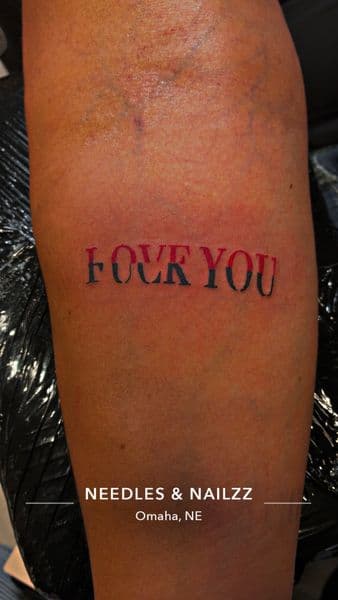 Lettering + Color text tattoo on Upper Arm by PoeMyInk on TattMe