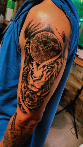 Black & Grey + Realism lion tattoo on Half Sleeve by PoeMyInk on TattMe