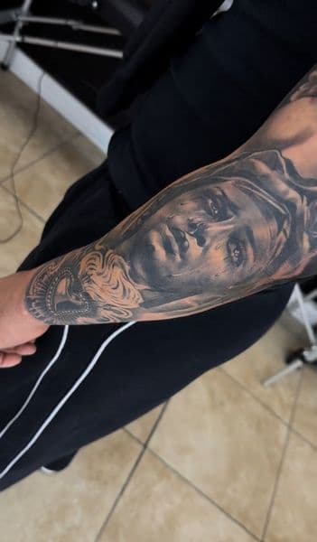 Black & Grey + Realism religious figure tattoo on Forearm by Resevoir_tattoo_artist on TattMe