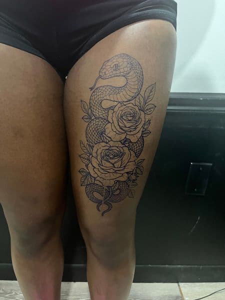Line-work + Floral snake tattoo on Thigh by AnimatedLifestyle on TattMe