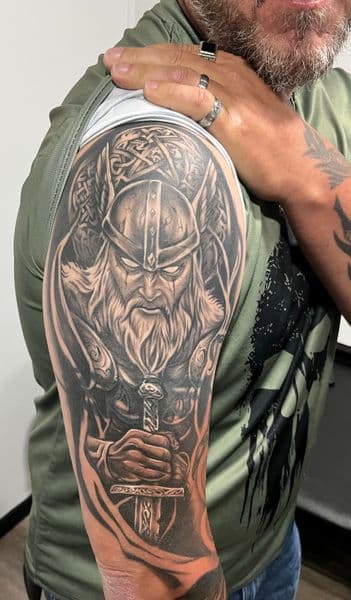 Black & Grey + Realism viking tattoo on Upper Arm by AnimatedLifestyle on TattMe