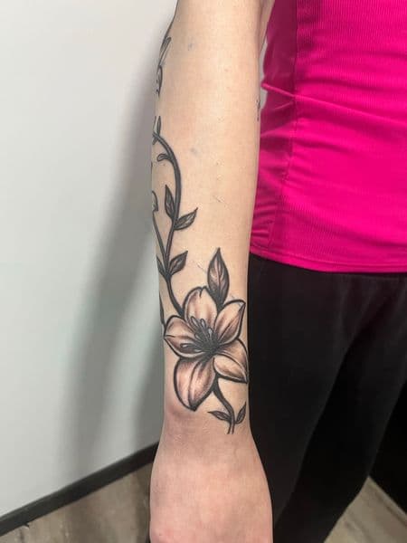 Black & Grey + Illustrative flower tattoo on Forearm by AnimatedLifestyle on TattMe
