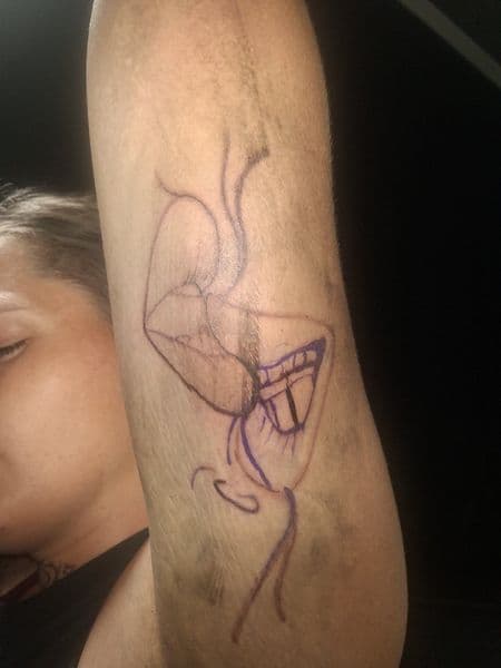 Line-work + Illustrative lips tattoo on Upper Arm by KUSTOM_INK_TATTOOS on TattMe
