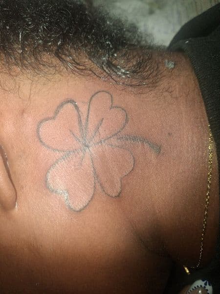 Fine Line + Black-work clover tattoo on Behind Ear by KUSTOM_INK_TATTOOS on TattMe