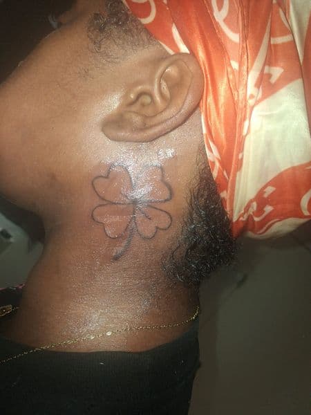 Fine Line + Black-work clover tattoo on Neck (Side) by KUSTOM_INK_TATTOOS on TattMe