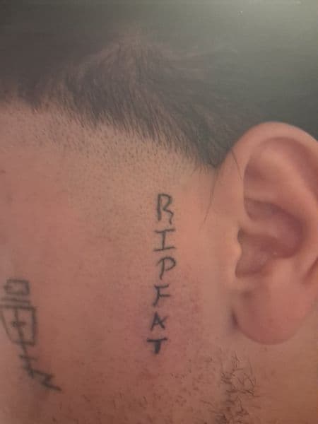 Lettering + Fine Line lettering tattoo on Face by KUSTOM_INK_TATTOOS on TattMe