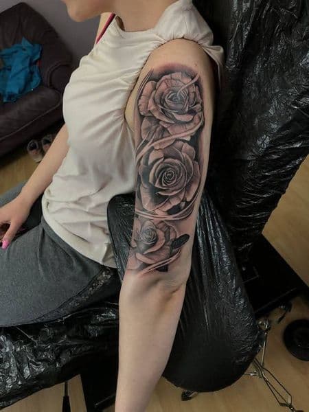 Black & Grey + Realism roses tattoo on Half Sleeve by KUSTOM_INK_TATTOOS on TattMe