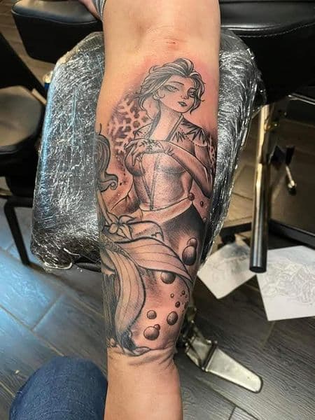 Black & Grey + Illustrative mermaid tattoo on Forearm by KUSTOM_INK_TATTOOS on TattMe
