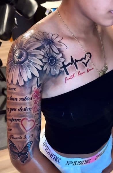 Black & Grey + Floral flowers tattoo on Upper Arm by white..tatt_ink on TattMe