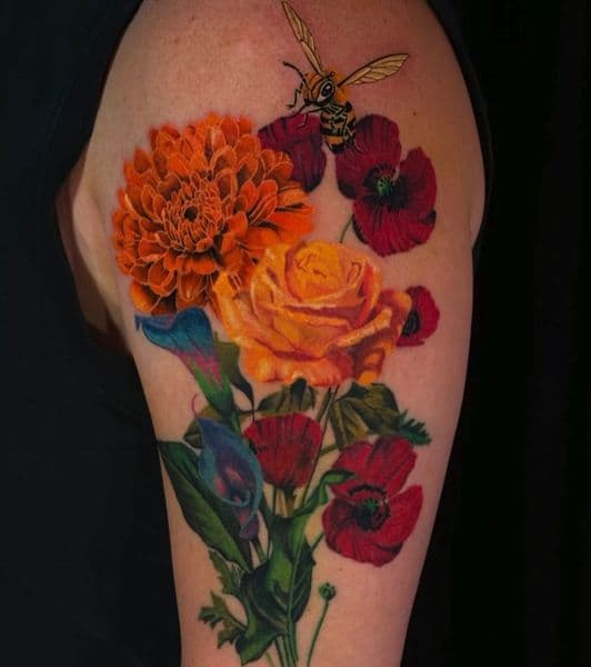 Color + Realism flowers tattoo on Upper Arm by pauljacktattoo on TattMe
