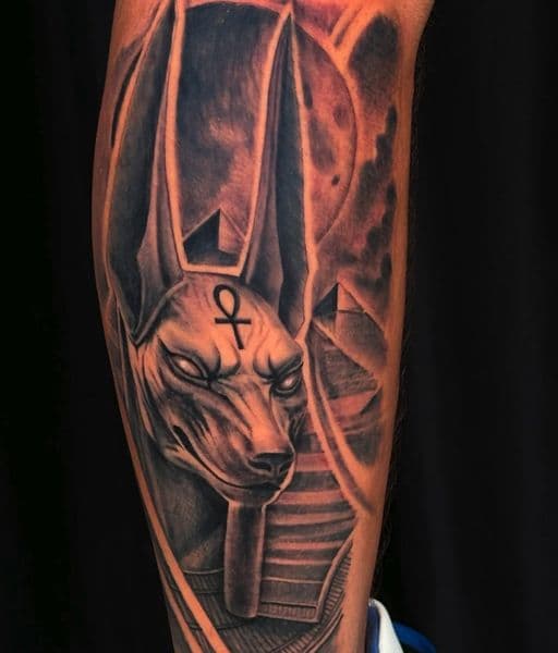 Realism + Black & Grey anubis tattoo on Calf by pauljacktattoo on TattMe
