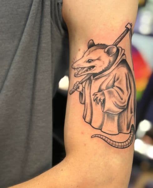 Black & Grey + Illustrative opossum tattoo on Upper Arm by Anderson_tat_ on TattMe