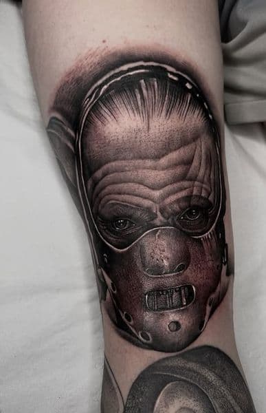 Realism + Black & Grey hannibal lecter tattoo on Forearm by chroma_tattoo_parlour on TattMe