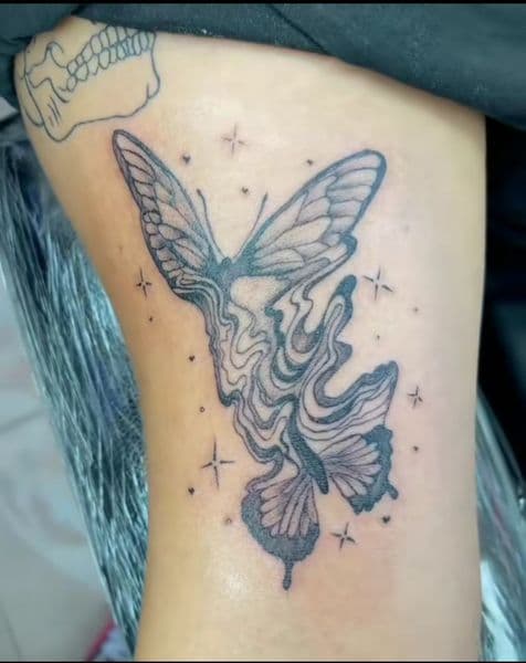 Black-work + Illustrative butterfly tattoo on Upper Arm by reservoir_tattoo_studio_ on TattMe