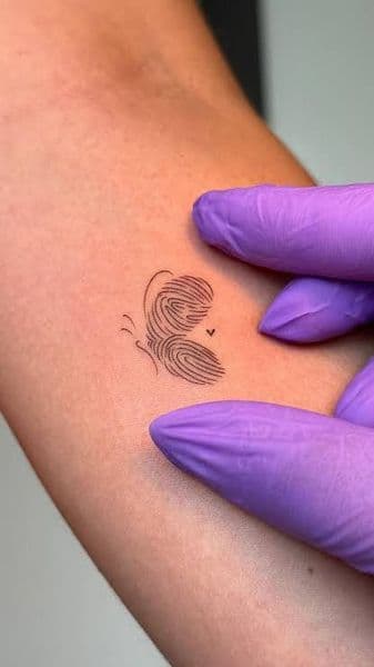 Fine Line + Minimalist butterfly tattoo on Upper Arm by Ace_Monroe on TattMe