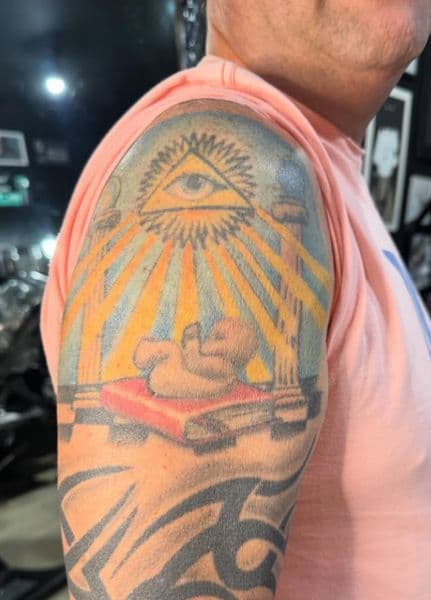 Traditional + Tribal all-seeing eye tattoo on Upper Arm by Darrell_B._Austin on TattMe