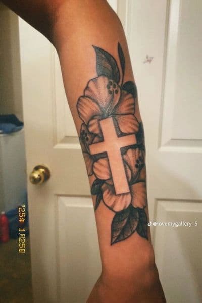 Black & Grey + Floral cross tattoo on Forearm by TROUBLECHILXD_TATTOS on TattMe