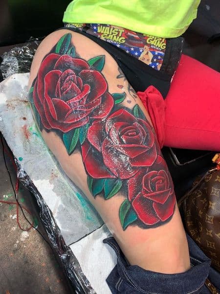 Traditional + Color roses tattoo on Thigh by ink_by_christian on TattMe