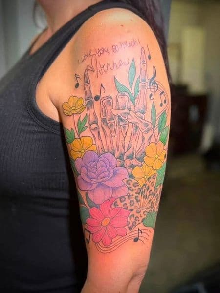 Color + Illustrative skeleton hand tattoo on Half Sleeve by jennyandkai on TattMe