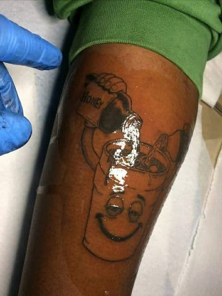 Black-work + Illustrative cup tattoo on Upper Arm by jennyandkai on TattMe