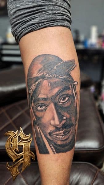 Realism + Black & Grey tupac shakur tattoo on Calf by Gcreationart1 on TattMe