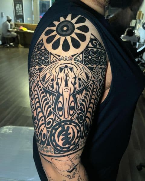 Black-work + Geometric elephant tattoo on Upper Arm by transcendingink on TattMe