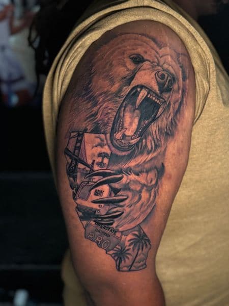 Black & Grey + Realism bear tattoo on Upper Arm by transcendingink on TattMe