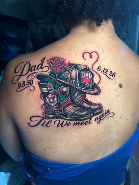 Realism + Script firefighter helmet tattoo on Upper Back by transcendingink on TattMe