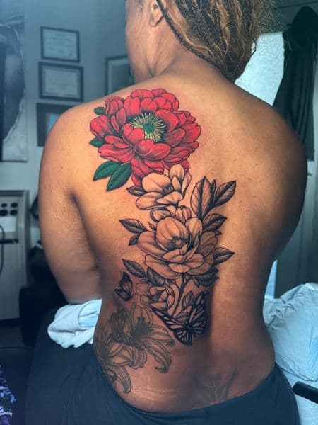 Floral + Color peony tattoo on Upper Back by transcendingink on TattMe