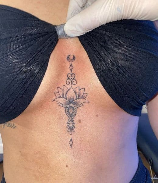 Fine Line + Black-work lotus tattoo on Sternum by Ruth_usyw7627t on TattMe