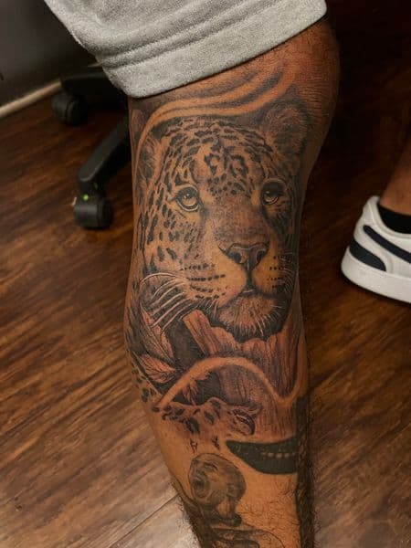 Realism + Black & Grey jaguar tattoo on Calf by trktattoos on TattMe