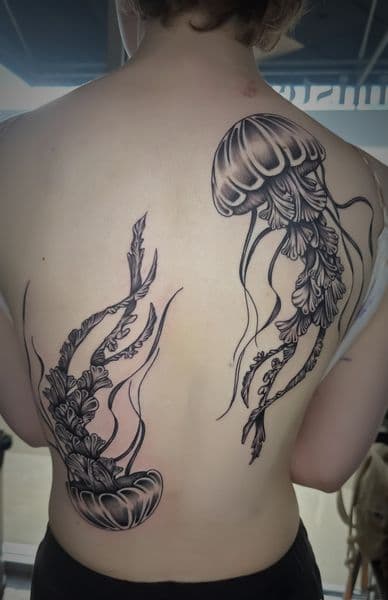 Black & Grey + Illustrative jellyfish tattoo on Upper Back by Taylor_Miller on TattMe