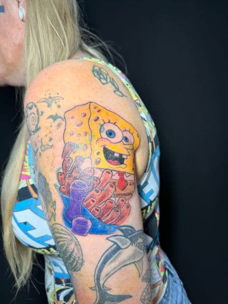 Cartoon + Color spongebob tattoo on Upper Arm by tattoosbyJkelly88 on TattMe
