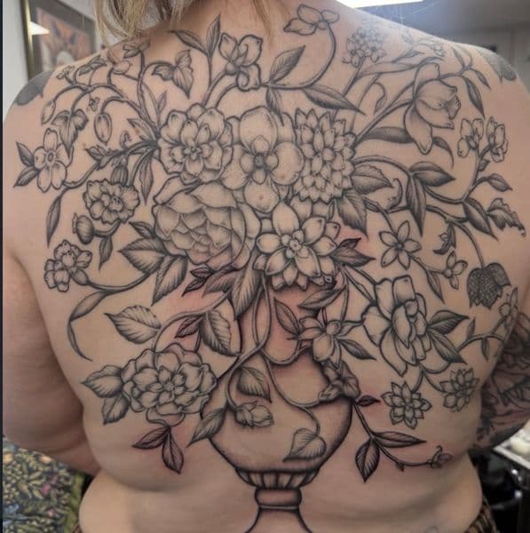 Black & Grey + Floral flowers tattoo on Upper Back by Jessica_ on TattMe