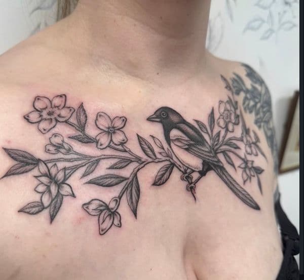 Black & Grey + Illustrative bird tattoo on Chest by Jessica_ on TattMe