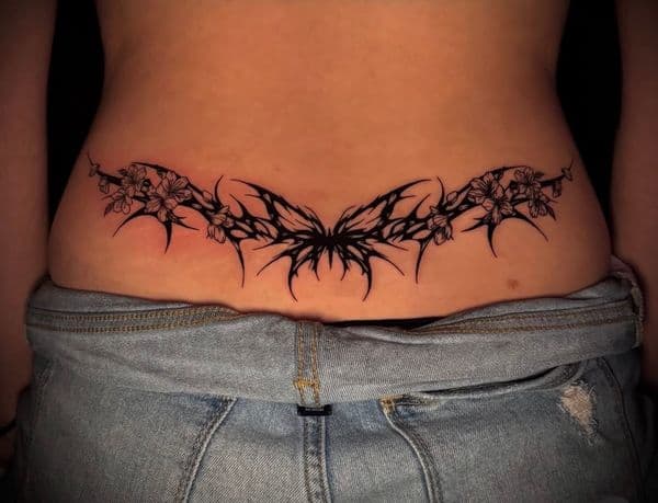 Black-work + Illustrative butterfly tattoo on Lower Back by oldtown_ink on TattMe