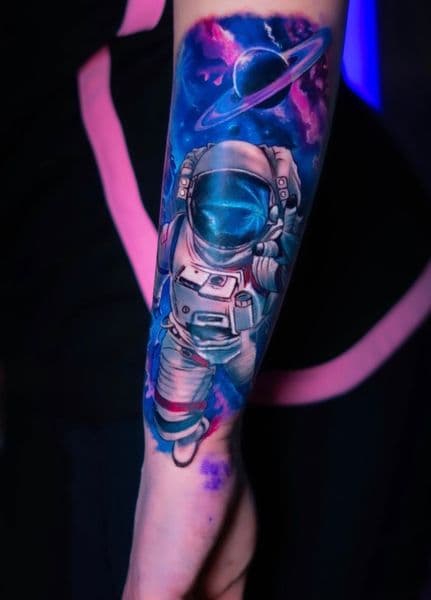Color + Illustrative astronaut tattoo on Forearm by oldtown_ink on TattMe