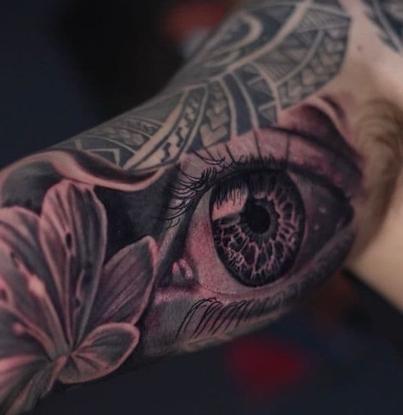 Realism + Black & Grey eye tattoo on Upper Arm by oldtown_ink on TattMe