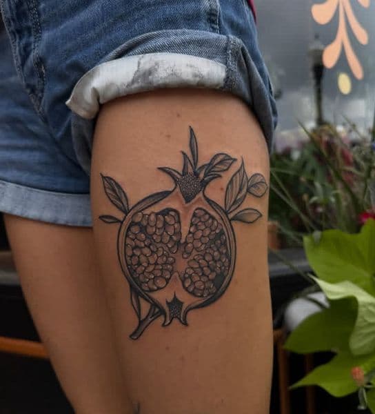 Black & Grey + Illustrative pomegranate tattoo on Thigh by katetattoo on TattMe